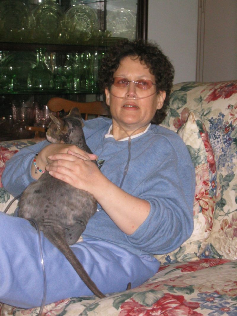 Robi and her favorite cat, Fuzzee